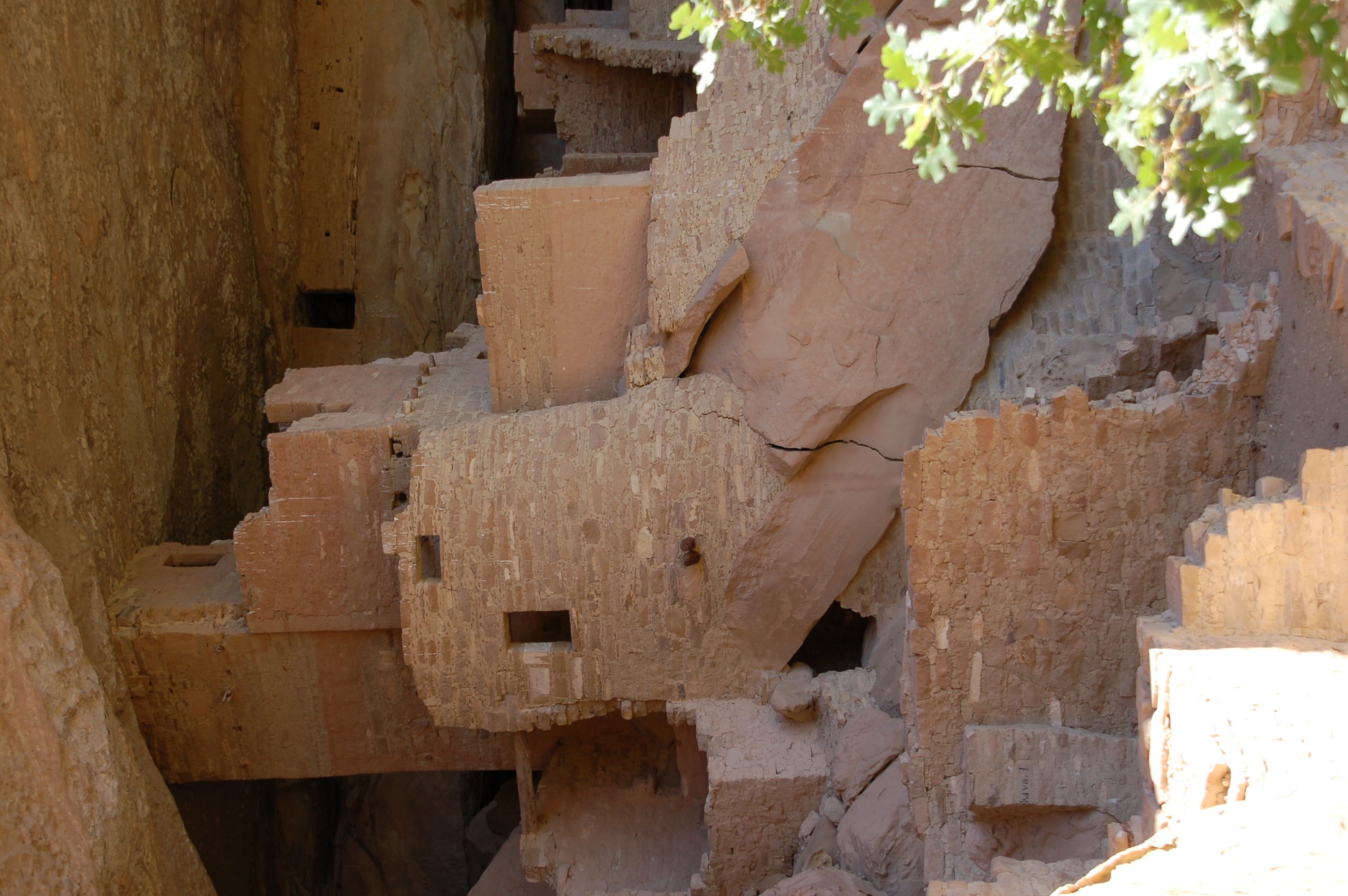 A picture containing building, cliff, nature
